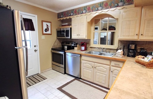 Red River House | CJ Townhouse 14 - On The River - Across from the Fishing Ponds - In Town - Near