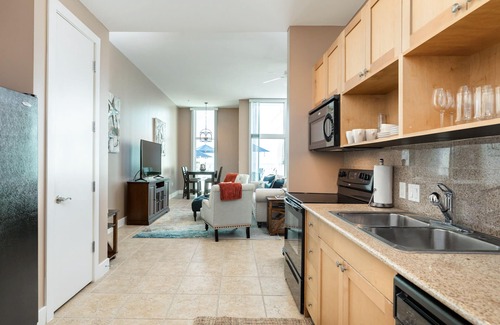 Galveston Apartment | Elegant gulf escape with heated pool, hot tub, beach access, & water views
