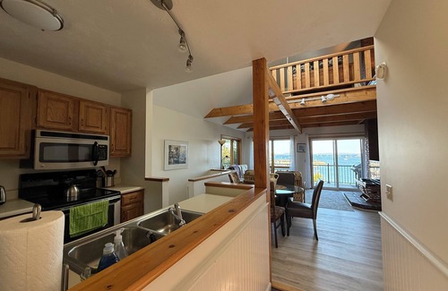 Southwest Harbor Condo | Enjoy the stunning ocean view from the hot tub!
