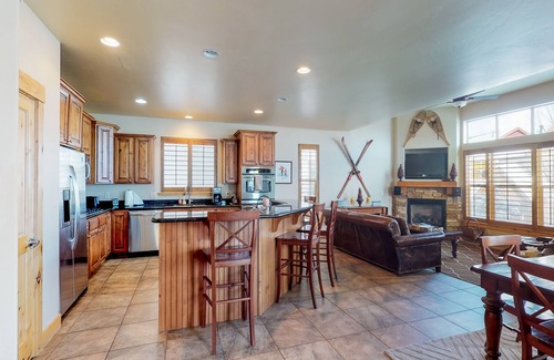 Bear Hollow Village House | Fantastic home with fireplace, private hot tub, central AC, and pool access
