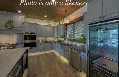 Pigeon Forge Cabin | Grand Forge Lodge - 16 Bedrooms in the MIDDLE of Pigeon Forge! Loaded!