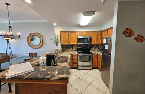 Dauphin Island Condo | Inn at Dauphin Island 109 Family Friendly Sleeps 8-Walk out to Pool and Beach