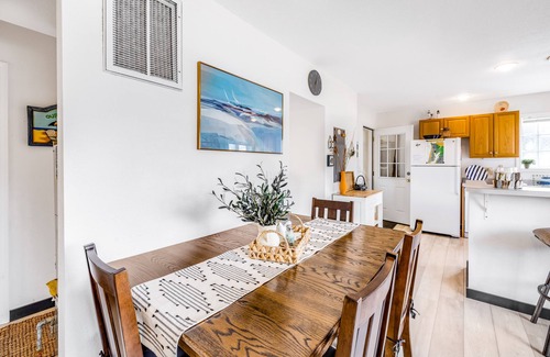 Roads End House | Inviting Haven with Large Yard, WiFi & Partial Ocean View - Steps to Beach