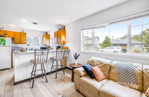 Roads End House | Inviting Haven with Large Yard, WiFi & Partial Ocean View - Steps to Beach