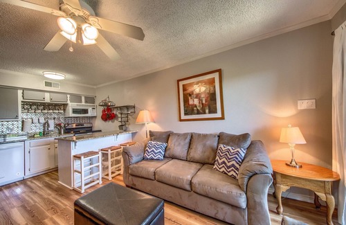 New Braunfels Condo | Located right on the Comal River! Pool, hot tub and direct river access!