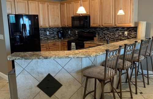 Osage Beach Condo | Luxurious TOP FLOOR condo with a 10 Mile View in the heart of Osage Beach!