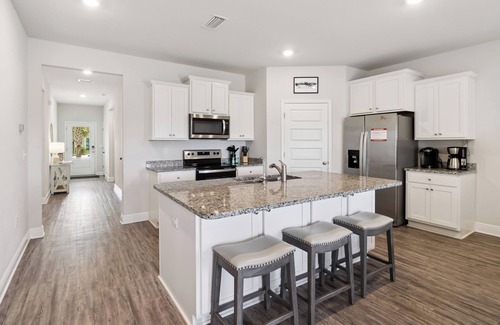 Port St. Joe House | New Listing! Falling Star Retreat is a 4BA/2BA coastal home, just 900 feet to the beach!