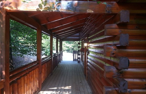 Pigeon Forge Cabin | Real Log Cabin 2 Bedroom, 2 Full Bath, Full Kitchen Close To All Attractions.