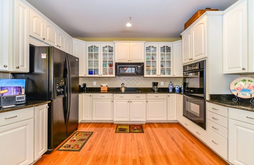 Sunset Island House | Restful Luxury 6 Bedroom House with WiFi In Gated Community On Bayside With Indoor/Outdoor Pools, Private Beaches, Restaurant, And More Just Ten Minutes From Beach!