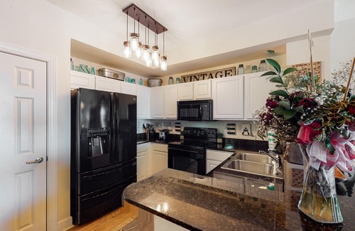 Panama City Beach Condo | Richly designed beachfront condo with pools, hot tub, gym & amazing views