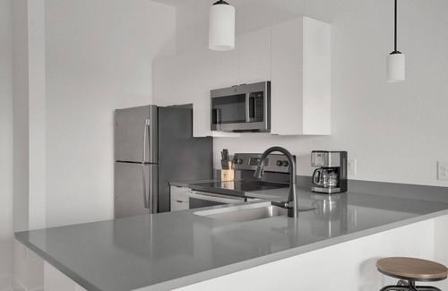 West Colfax Apartment | Sleek Sloan's Lake 1BR w/ Gym, W/D & Roof Deck, near Park, by Blueground