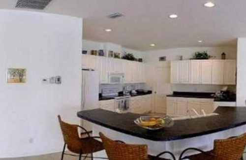 Pelican House | Spacious Waterfront w/Solar Heated Pool Home