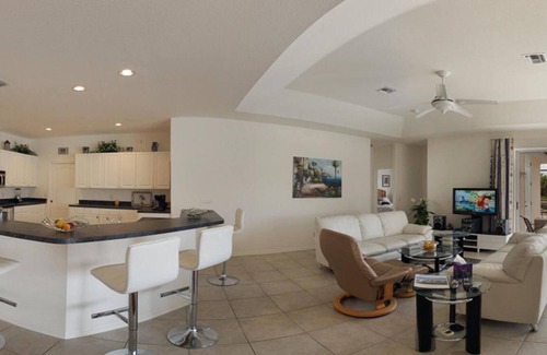 Pelican House | Spacious Waterfront w/Solar Heated Pool Home