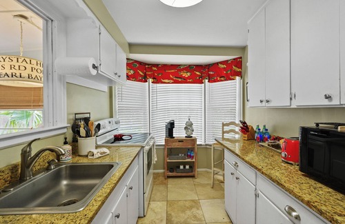 Kings Terrace House | St. Simons Island Walkable Beach Days Fire Pit Nights Fenced Yard
