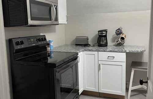 West Hill Apartment | The Yellow-Shuttered House apt B