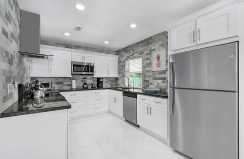 Royal Poinciana Villa | Your house with 4 bedroom 3 full bathrooms 6 min to the beach