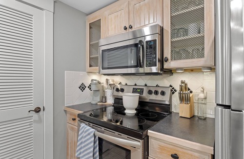Baytowne Wharf Condo | 1BR Condo at Baytowne! Steps to Wharf, Tropical Pool & Hot Tub, Balcony View.