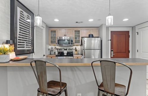 Baytowne Wharf Condo | 1BR Condo at Baytowne! Steps to Wharf, Tropical Pool & Hot Tub, Balcony View.