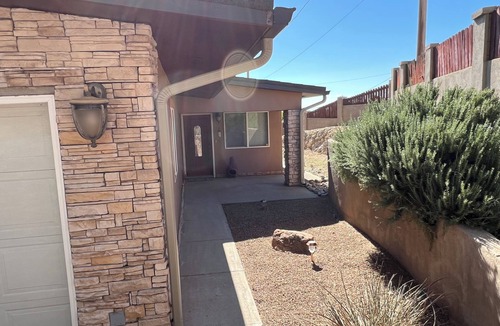 Northeast Heights House | 3 BR 2 BA Guest House with heated pool, hot tub, outdoor kitchen & putting range