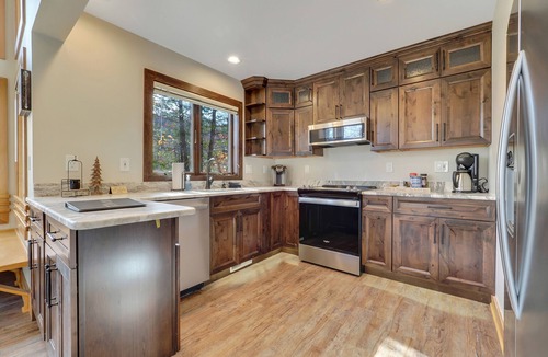 Boyne Falls Condo | 4BR Boyneland Slopeside Disciples Village Condo | Fireplace| Ski Cubbies