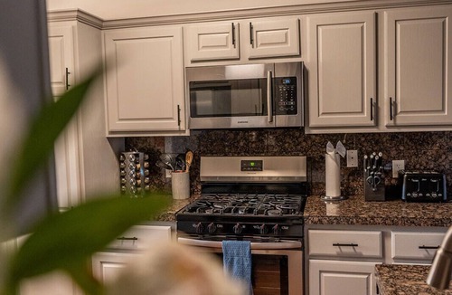 University Hills and Windsor Park House | 4BR Heated Pool & Theater for Group, ACL/F1, Min to DT, UT, and Moody Center