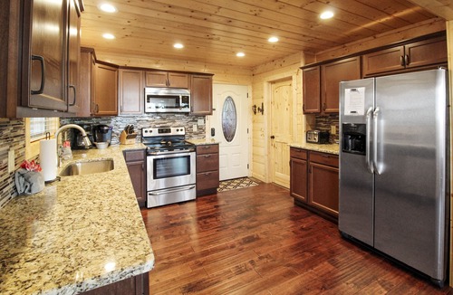 Chalet Village North Cabin | AMAZING 4 Suite Cabin w/VIEWS! Game Room! Theater! 3 Decks! Fire Pit! Hot Tub!