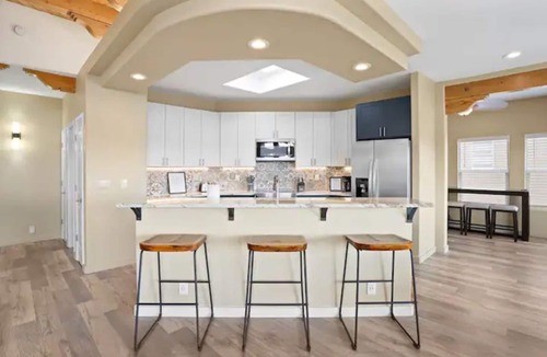 Taylor Ranch House | Amazing views of the mountains and city with game room and putting green!
