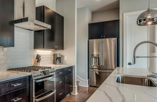 Edgehill House | Amplify at the Gulch modern 3 story condo 2 car garage rooftop fire pit security and view