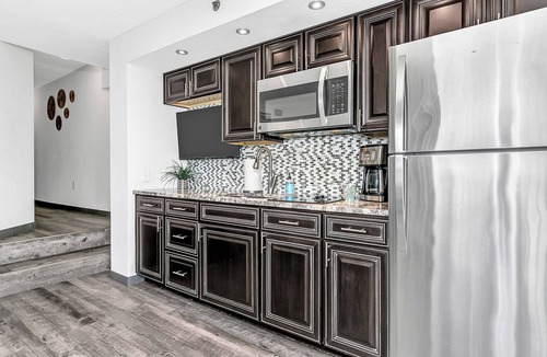 Windy Hill Condo | Best view at Beach Cove- Tropical oceanfront corner condo with double balcony!