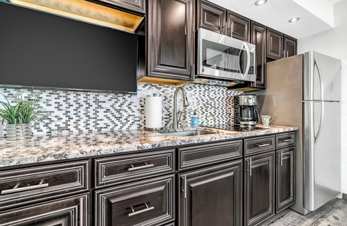 Windy Hill Condo | Best view at Beach Cove- Tropical oceanfront corner condo with double balcony!