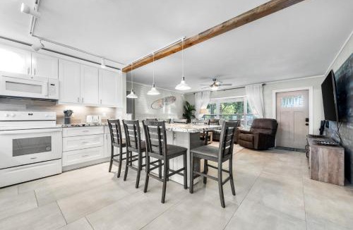 Boynton Beach House | Boho Tiki Villa w Heated Saltwater Pool, King Beds & 6TVs