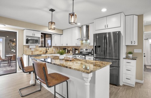 Oak Park House | Bright, Spacious 4BD Suburban Nest w/Garage & Yard, hosted by DenverStays