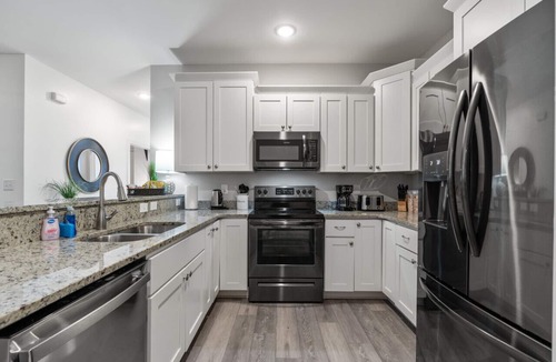 Myrtle Beach Apartment | C · Modern 4BR Ground Level King Beds Steps 2 Beach #C