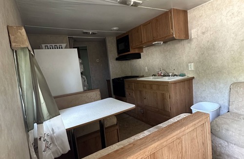 Glouster House | Camper located in the heart of Burr Oak State Park