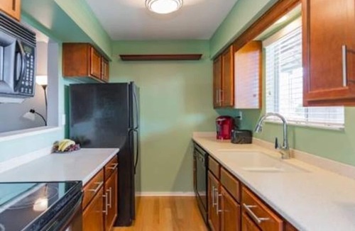 East Bank Condo | Captain's Quarters Riverfront #2