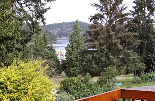 Oak Harbor Ski Chalet | Chalet overlooking quiet bay, surrounded by Deception Pass state park