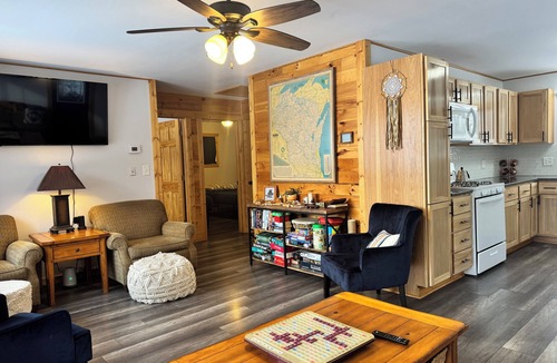 Birchwood House | Charming 2-bedroom cottage with WiFi, AC on quiet lake on trails with kayaks.