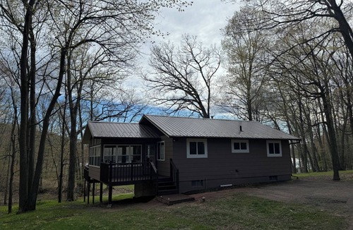 Birchwood House | Charming 2-bedroom cottage with WiFi, AC on quiet lake on trails with kayaks.