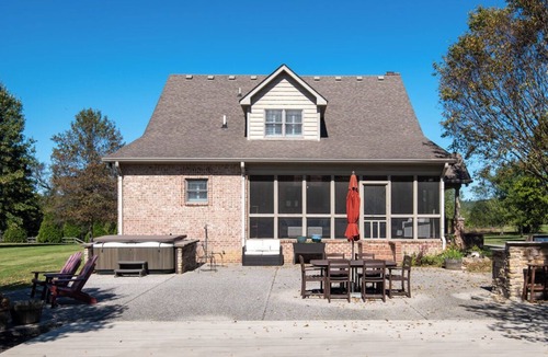 Bethpage House | Charming 3 bed, 2.5 bath farmhouse with hot tub, firepit, and seasonal pool!