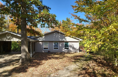 Oxford House | Charming home on a beautiful wooded lot less than 1.5 miles from Miami's campus.