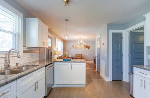Woodbine House | Charming townhome less than 4 miles to Downtown! Unit A