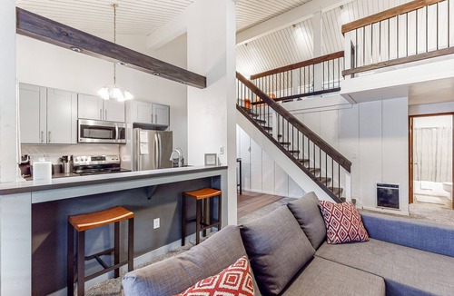 Mammoth Lakes Condo | Charming, two-story ski condo w/a wood stove, free WiFi, shared pool, & hot tub