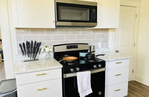 Crosstown House | Chic Crosstown Bungalow with large fenced backyard, Summer Special is on!
