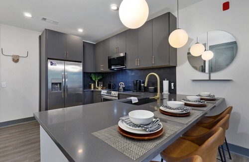 Rolling Mill Hill Condo | City-view condo with rooftop lounge, gym, & 10-minute walk to downtown