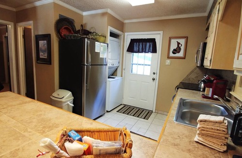 Red River House | CJ Townhouse 14 - On The River - Across from the Fishing Ponds - In Town - Near