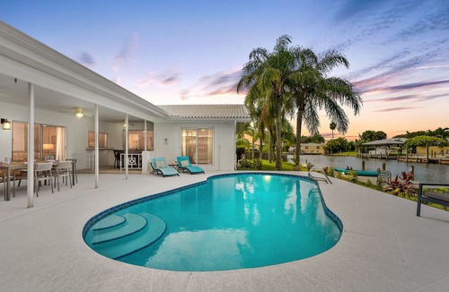 Venetian Way House | Cocoa Beach Coral Retreat waterfront 3 BR/2.5 BA