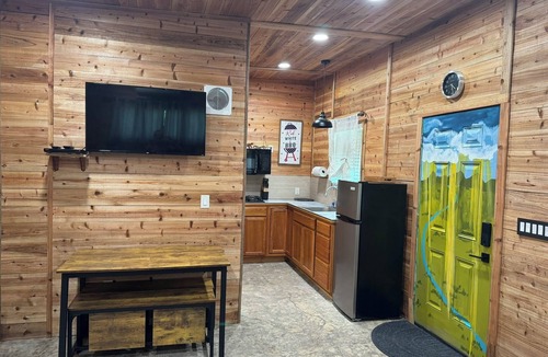 Cibolo Cabin | Comfy cabin at edge of 180 acre nature park w/pool, pickleball & volleyball