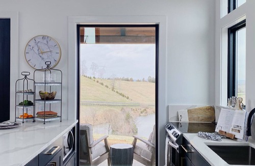 Kedron Cottage | Cottage with panoramic hilltop views and stocked pond on 80 acres.