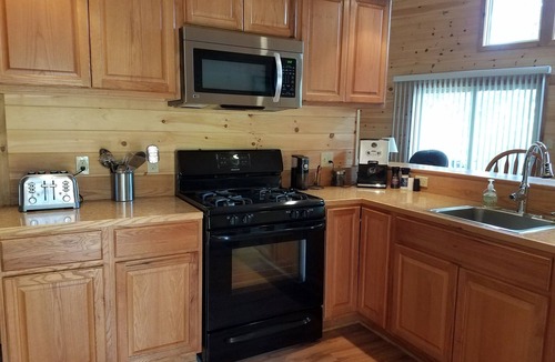 Southwest Harbor House | Cozy cottage nestled in the woods with walking distance to town.