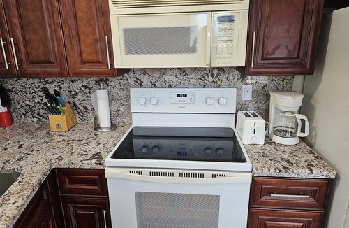 East Fort Lauderdale Apartment | Cozy Duplex overlooks the water and is within walking distance of the beach!